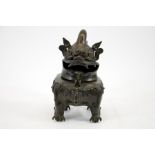 A Chinese bronze censer in the form of a dog, Ming