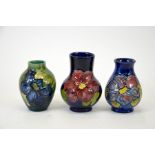 A group of three Moorcroft vases, all Clematis pattern, signed and impressed marks, (3)