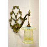 W A S Benson and James Powell and Sons, an Arts and Crafts brass wall light, model 1312