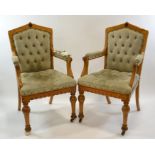 Charles Bevan (attributed), a pair of Gothic Revival oak open armchairs