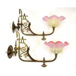 A pair of Aesthetic Movement brass wall lights