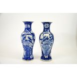 A pair of Chinese blue and white vases, Kangxi mark