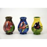 Walter Moorcroft, a group of three miniature vase's, baluster form, circa 1970