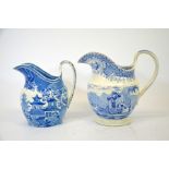 A Rockingham transfer printed blue and white jug, Scottish Highland scene and another