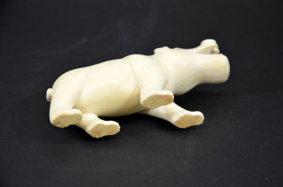 λ A 19th century African carved ivory figure of a hippo - Image 5 of 5