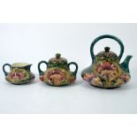 William Moorcroft, a Brown Chrysanthemum three piece tea set