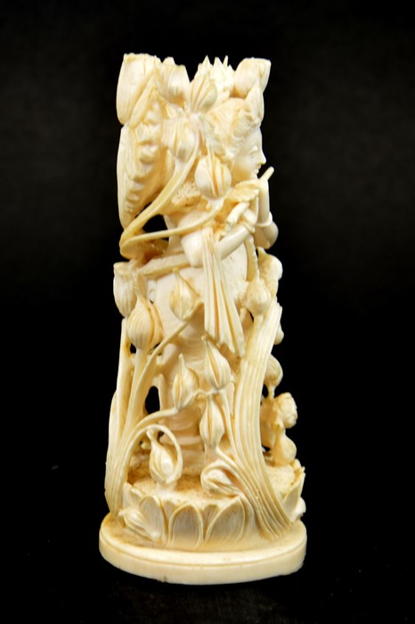 λ A 19th century Indian carved ivory figure of a deity playing the pipe - Image 4 of 6