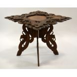 A 19th century Oriental carved hardwood occasional table