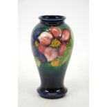 Walter Moorcroft, a Clematis vase, baluster form, blue ground