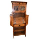 A Glasgow School, Arts and Crafts oak bureau, in the style of Wylie and Lochhead