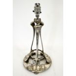 An Arts and Crafts silver plated table lamp