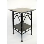 An Aesthetic Movement ebonised occasional table, in the style of E W Godwin