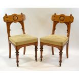 A pair of Gothic Revival oak chairs