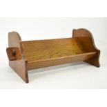 An Arts and Crafts peg jointed oak book trough