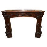 Louis Majorelle (attributed), a large Art Nouveau carved walnut fire surround