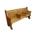 A Gothic Revival pine three seat pew