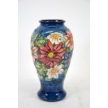 A Moorcroft Collectors Club 1998 vase, clematis pattern, blue ground,