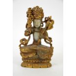 A Chinese gilt jade and bronze figure of a Buddhist deity