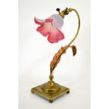 An Arts and Crafts brass and copper table lamp, in the style of W A S Benson