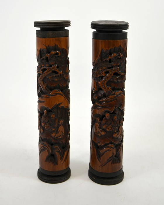 A pair of Chinese carved bamboo and reticulated joss stick holders