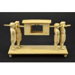 λ A 19th century Indian ivory figure group of a palanquin