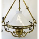 A large Aesthetic Movement brass pendant light fitting