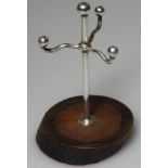 SILVER RING STAND WITH WOODEN BASE