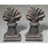 PAIR CASTIRON SHEAF DOOR STOPS