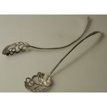 PAIR WHITE METAL CHINESE SPOONS