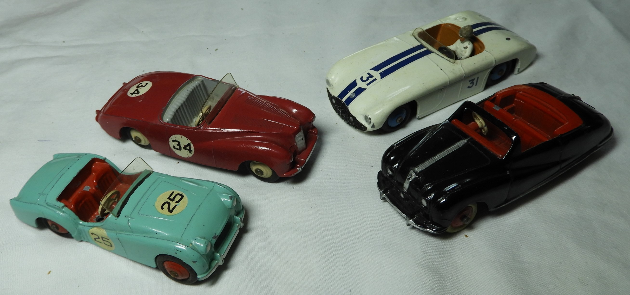 DINKY AUSTIN ATLANTIC, TRIUMPH TR2 111, SUNBEAM ALPINE 107 & CUNNINGHAM C-5R 133 WITH DRIVER