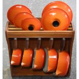 SET OF 5 LECREUSET ORANGE PANS WITH LIDS TO HANGING RACK