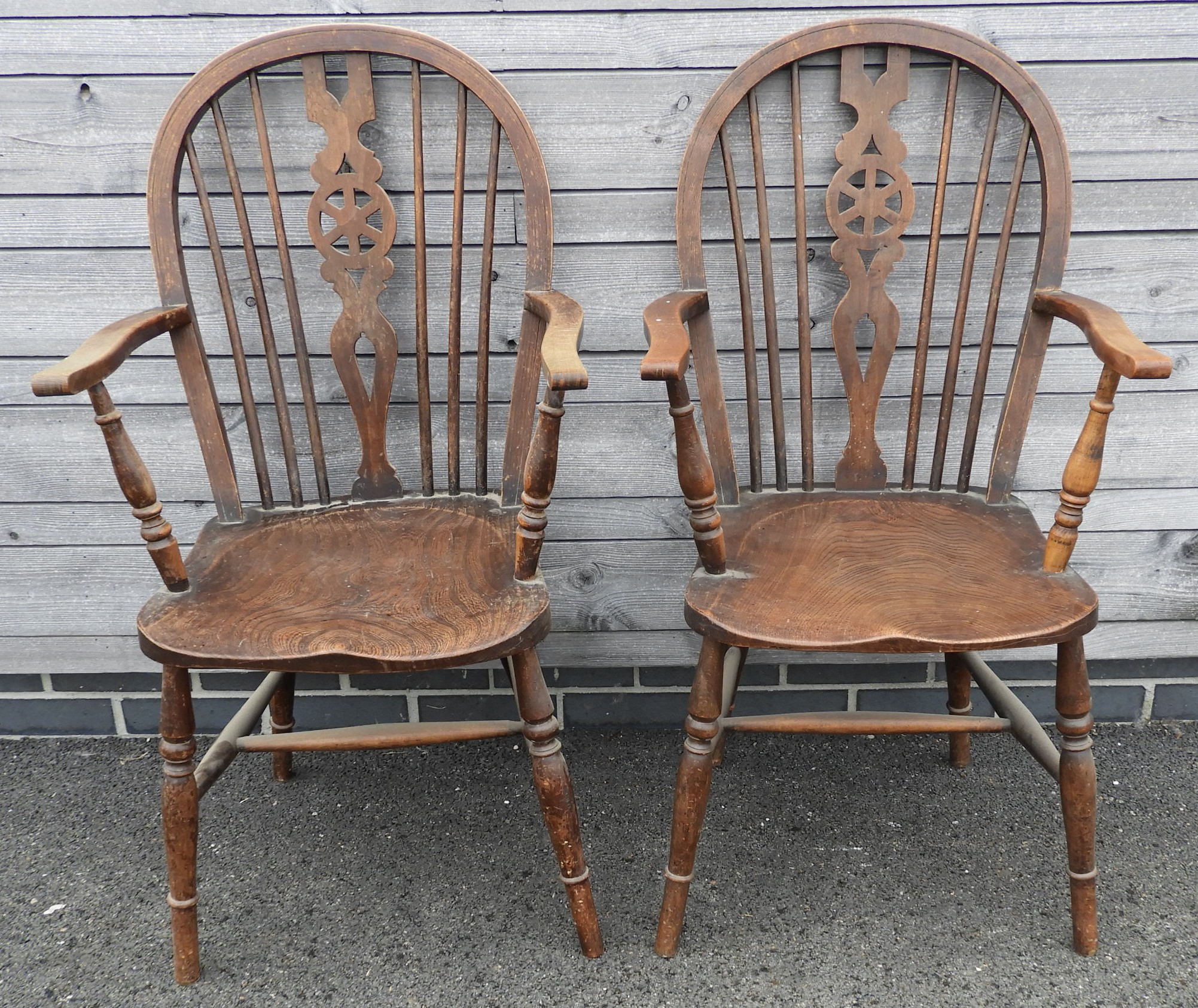 PAIR WHEELBACK CARVER CHAIRS