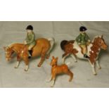 BESWICK 2 PONIES WITH RIDERS & A FOAL (1 A/F)