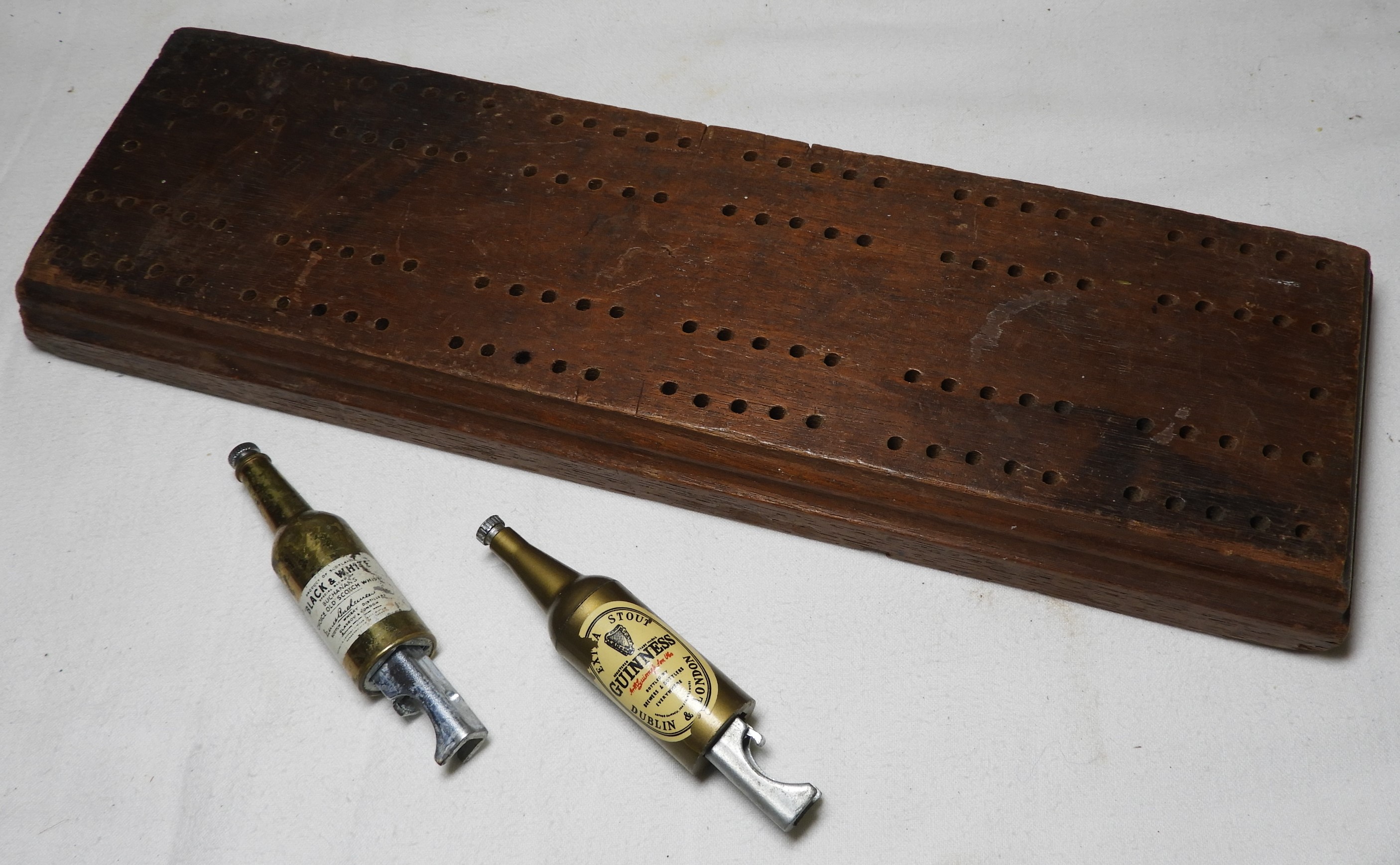 WOODEN CRIB BOARD & 2 ADVERT BOTTLE OPENERS