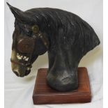 HORSES HEAD ON PLINTH