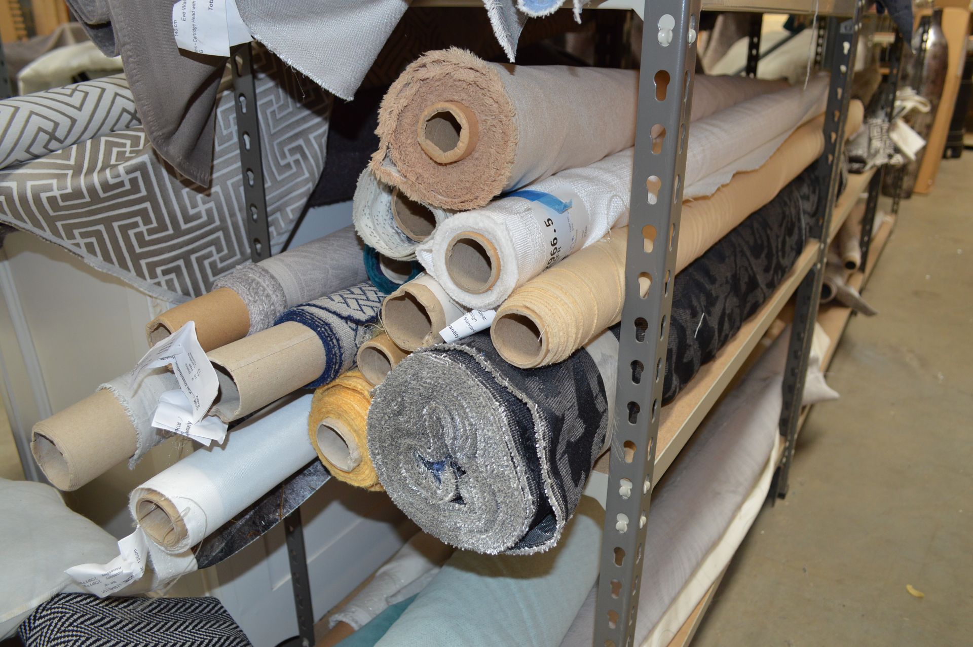 Quantity of Assorted Fabric Various Lengths & Colours includes Racking as shown (Please Note: item - Bild 4 aus 15