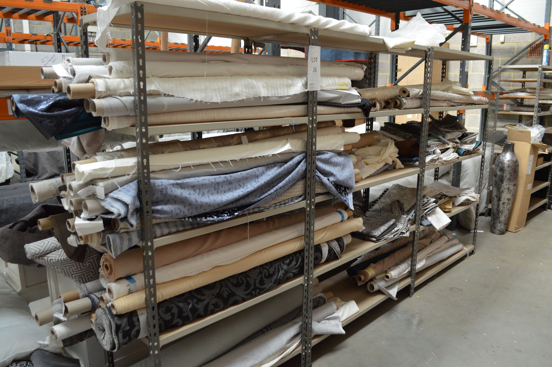 Quantity of Assorted Fabric Various Lengths & Colours includes Racking as shown (Please Note: item