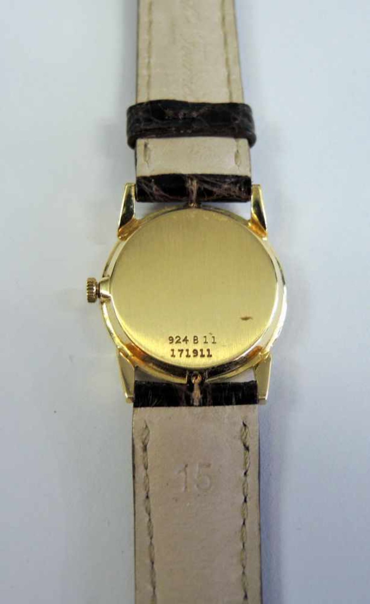 Piaget, Damen-Armbanduhr18 K. Gelbgold, mit braunem Lederband und Tigernaugen-Ziffernblatt braunes - Bild 2 aus 2