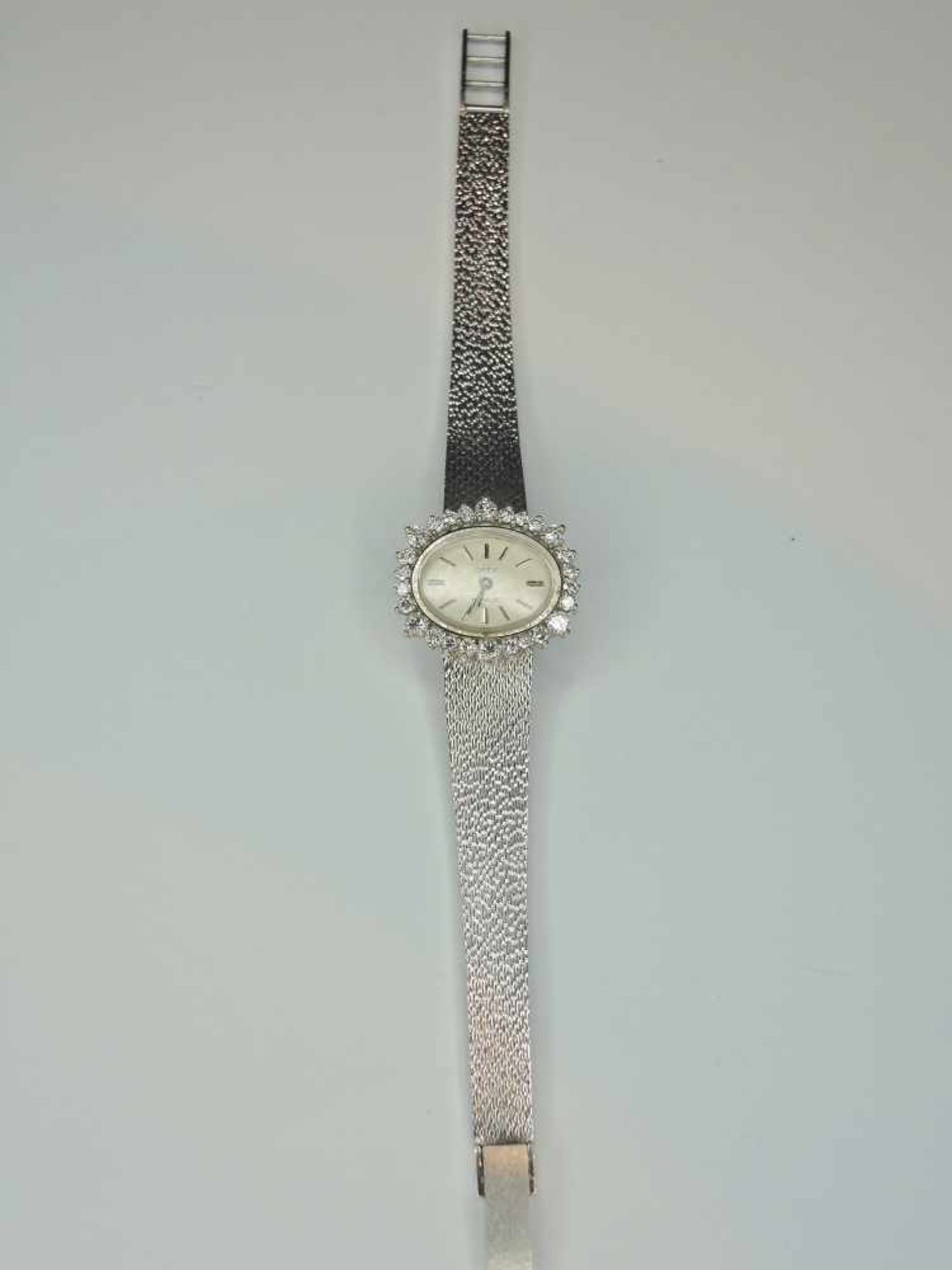 Orex, Damen-Armbanduhr18 K. Weißgold, besetzt mit Brillanten von ca. 1 ct. Handaufzug, gangbar.
