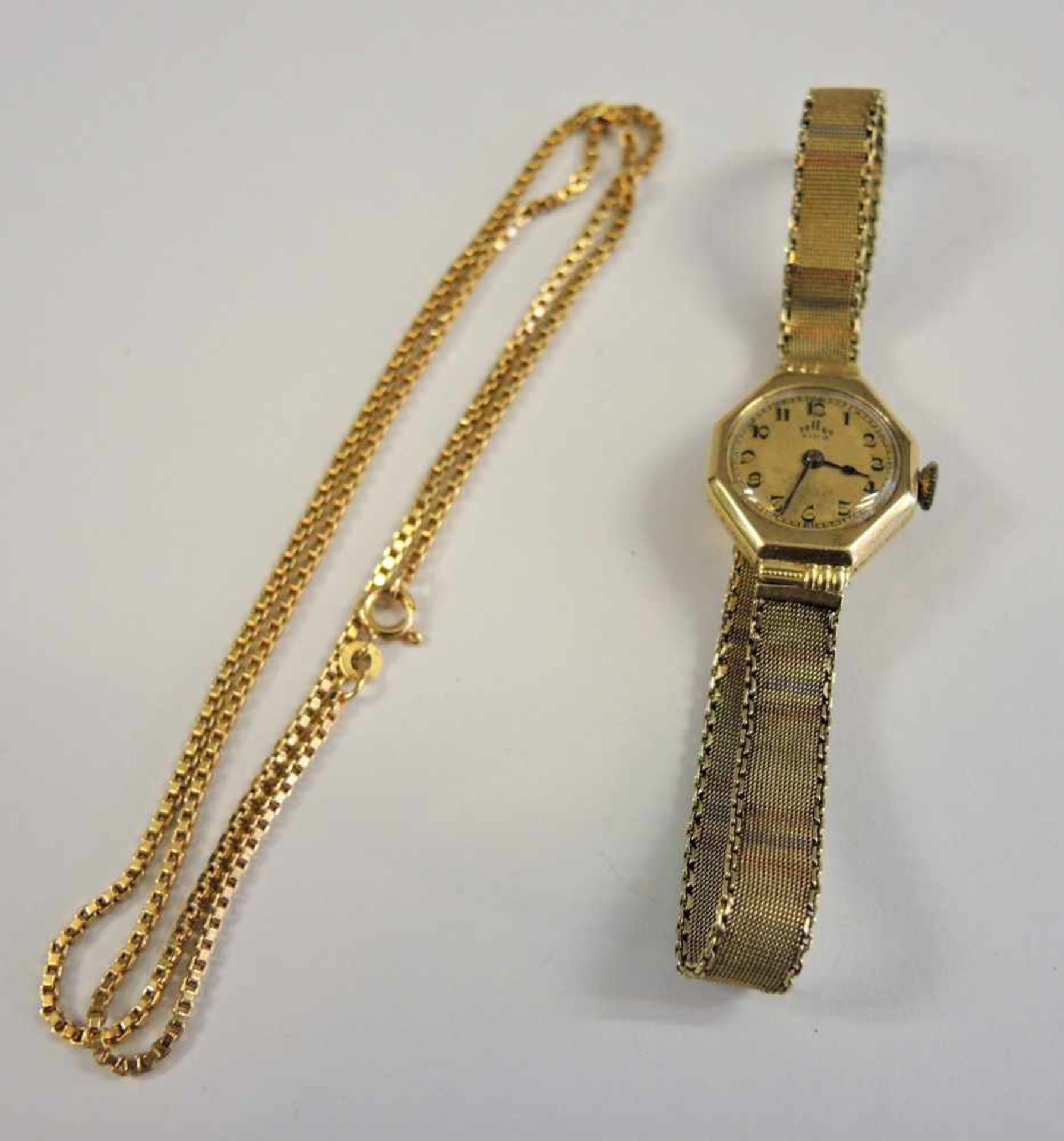 Goldkette und DamenuhrUhr der Marke Telus Extra in 14 K. Gelbgold, Gewicht 20 g. Halskette in 18