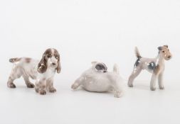 Drei Hundefiguren, Royal Kopenhagen 2 Terrier, Cockerspaniel unter der Glasur naturalistisch