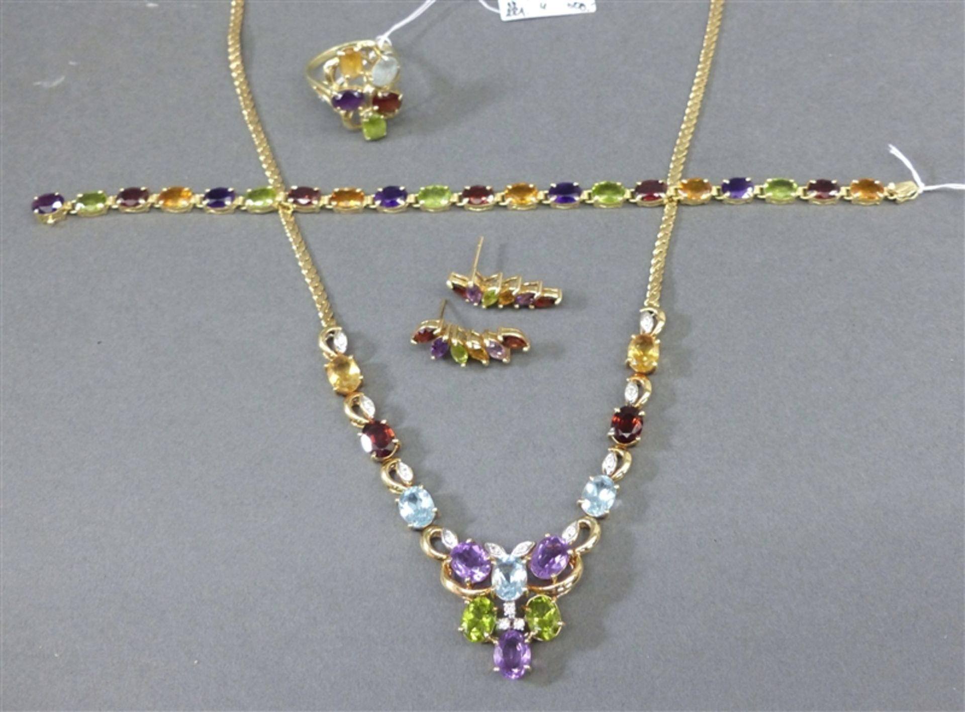 Schmuckset 14 kt. Gelbgold, verschieden farbige Edelsteine, Amethyst, Citrin, Peridot, Topas, 1