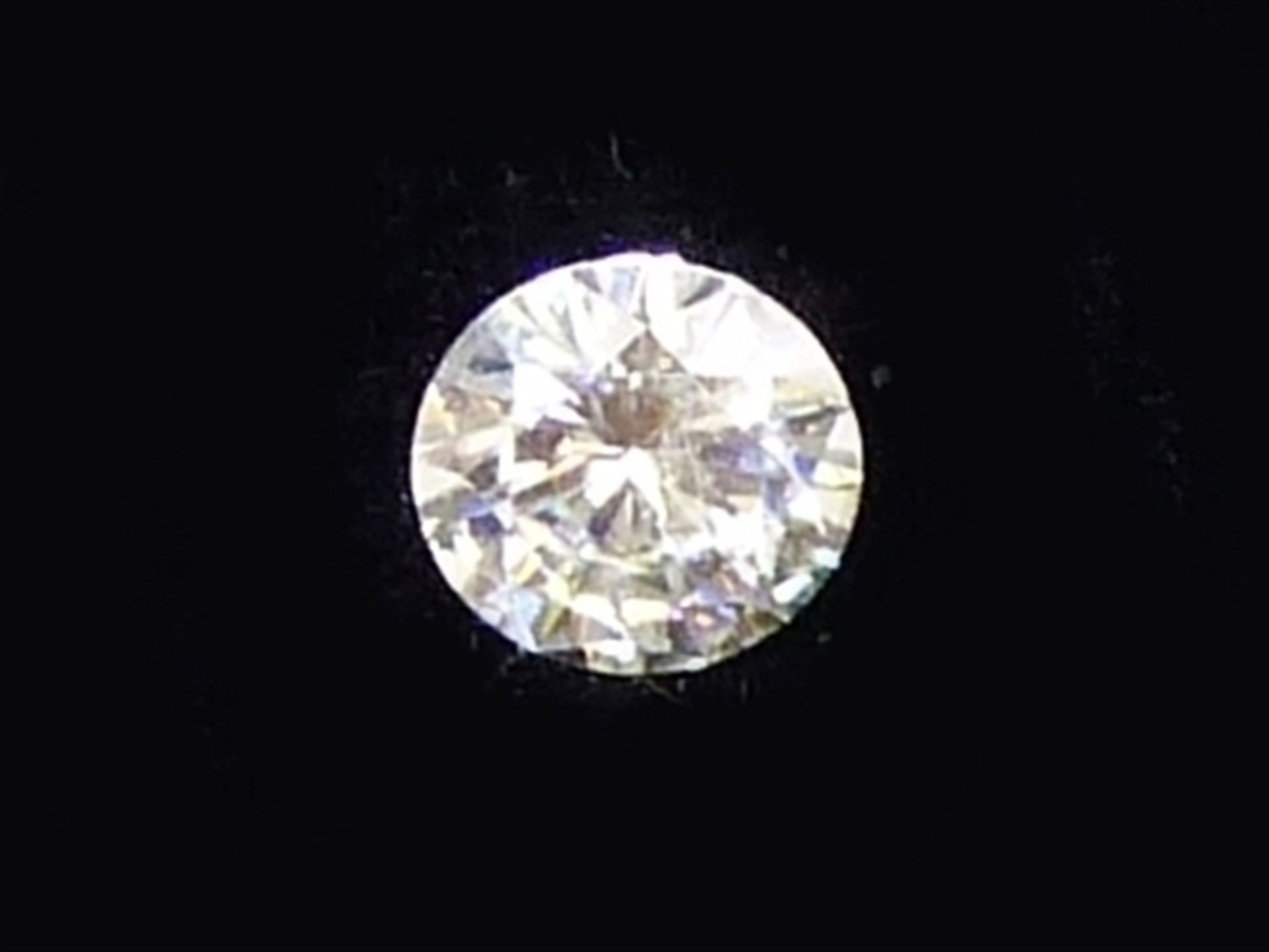 Brillantsolitär ungefasst, ca. 0,90 ct., light yellow, si,