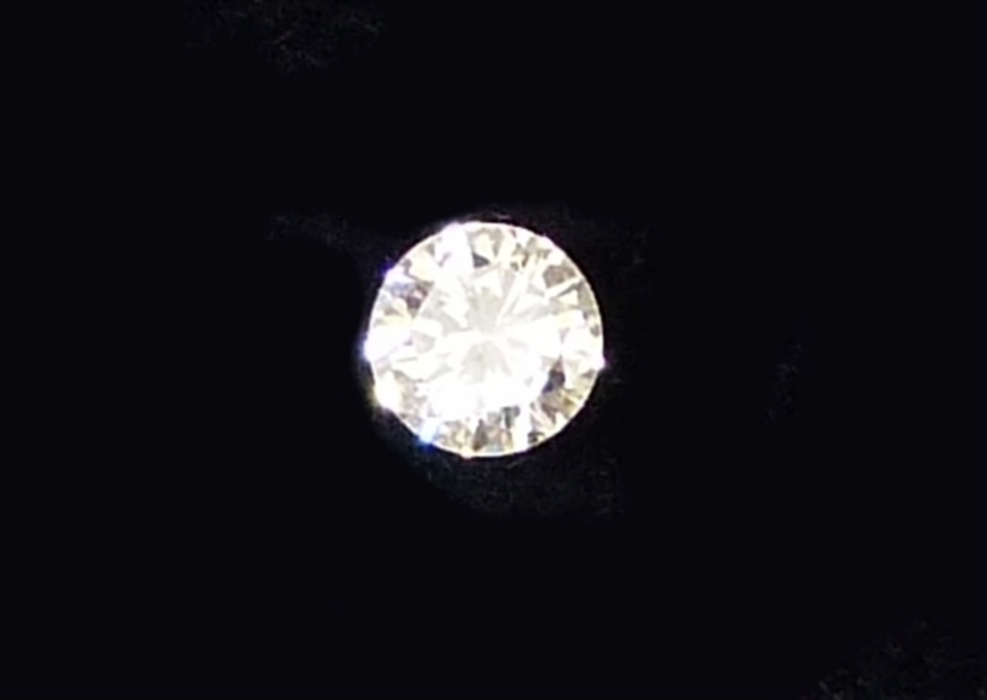 Brillantsolitär ungefasst, ca. 0,50 ct., getöntes weiß, si,