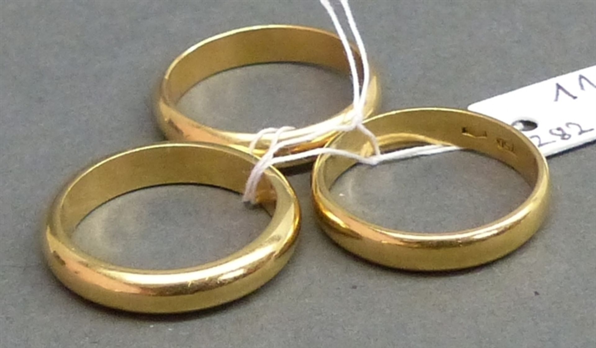 3 Eheringe 18 kt. Gelbgold, zusammen ca 12g,