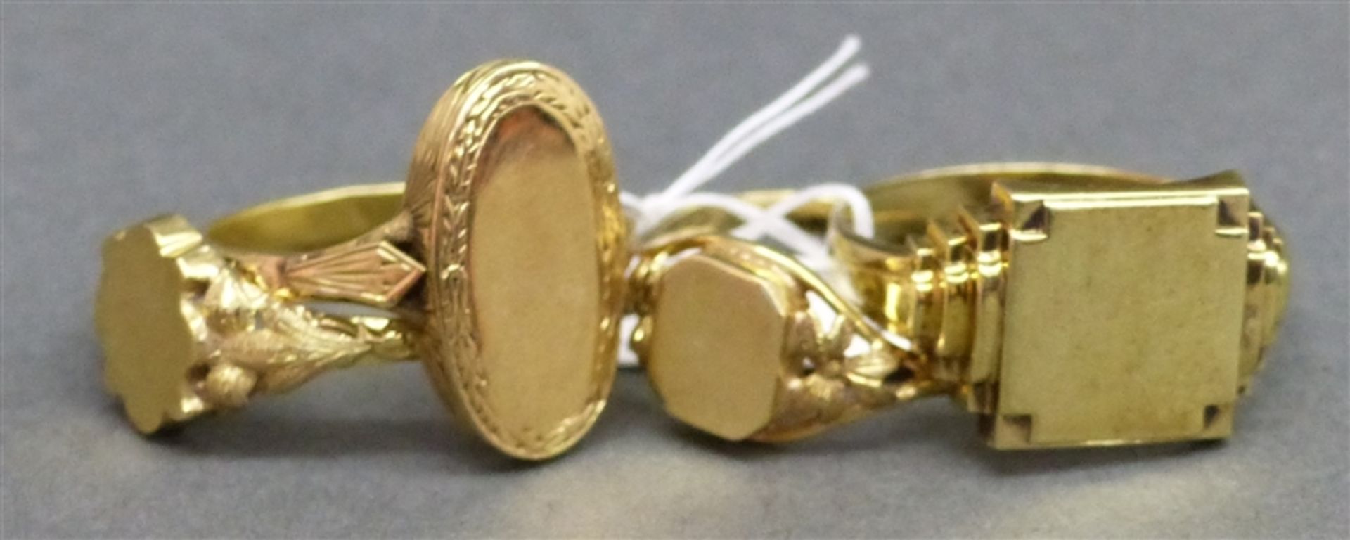 4 Damenringe 14 kt. Gelbgold, Monogrammringe, verschieden,