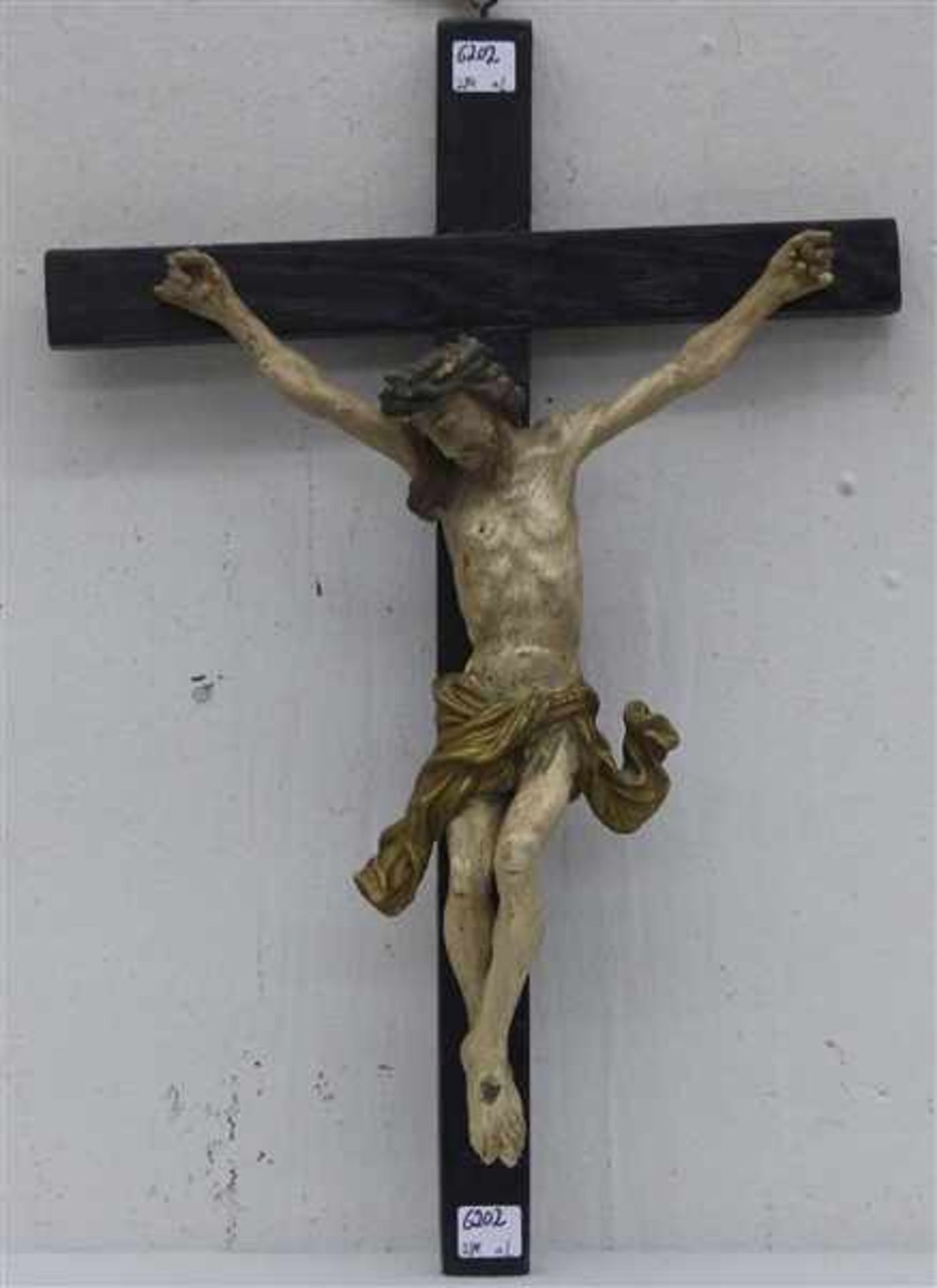 Kruzifixam Holzkreuz, gefasst, um 1920, bestoßen, Süddeutsch, Korpushöhe 34 cm,
