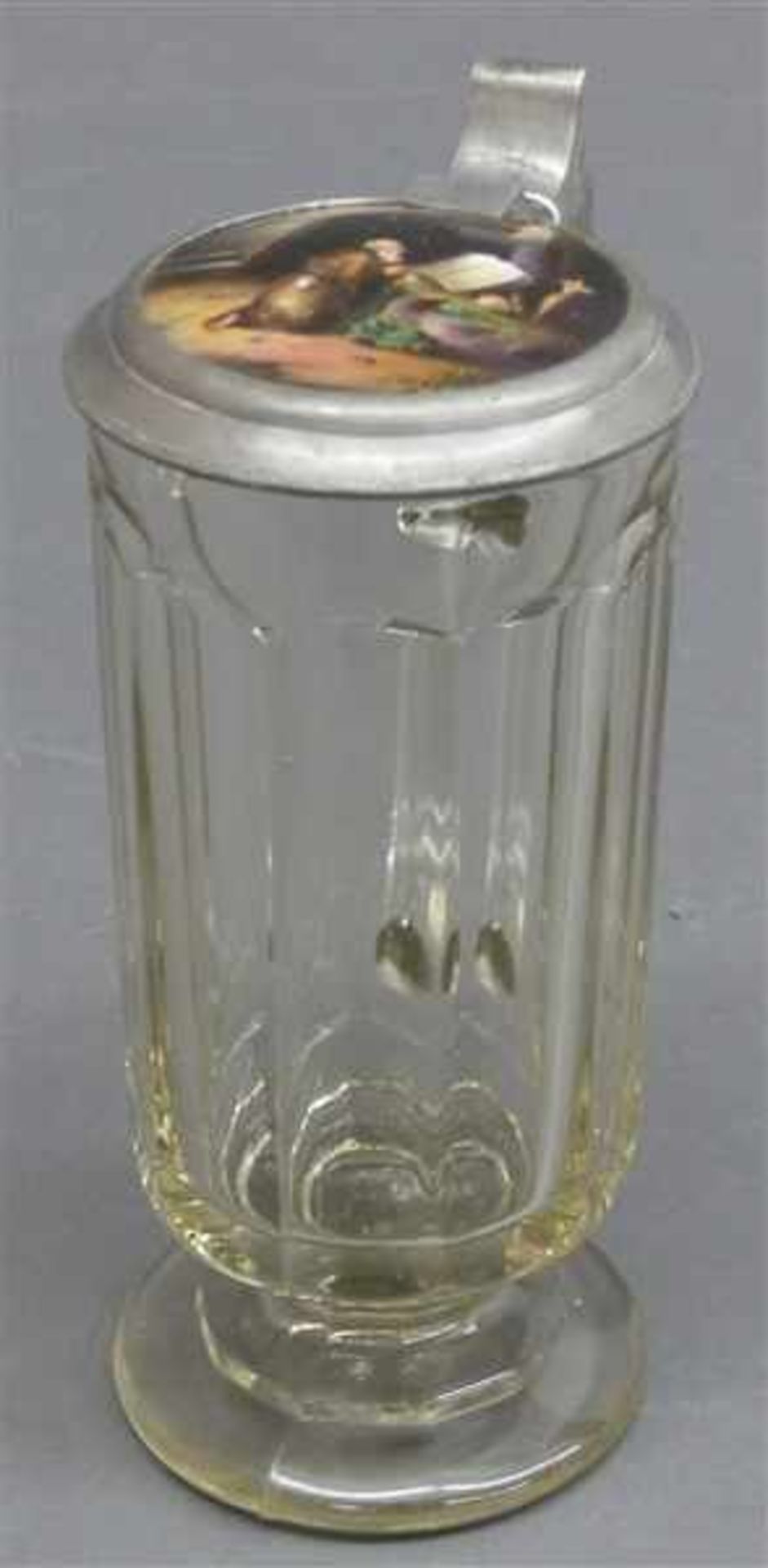 Bierkrug, 19. Jh.farbloses Pressglas, Zinndeckel mit Porzellaneinlage, "Einsiedler", h 19 cm,