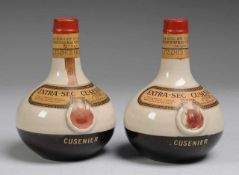 Paar Werbeflaschen "Extra-Sec Cusenier" Keramik, beige u. braun glasiert. Tiefgedrückt bauchige Form