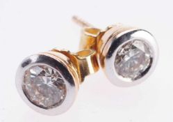 Paar Brillant-Ohrstecker585er GG/WG. Großer Brillant (ges. ca. 1 ct, getöntes Weiß, LR-WS) in